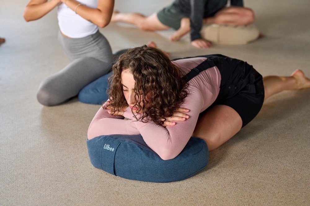 A gentle mobility and recovery session in a light-filled studio